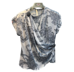 Haut femme blanc à motif élégant